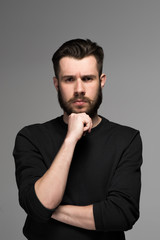 Fashion portrait of young man in black 