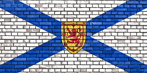 flag of Nova Scotia painted on brick wall