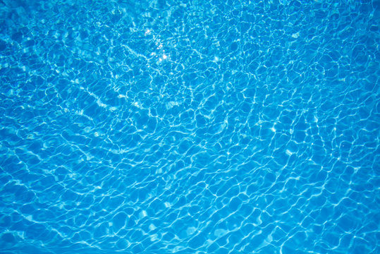 Blue and Bright water surface in swimming pool
