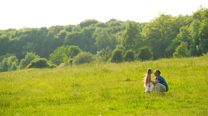Father communicates with his daughter.
