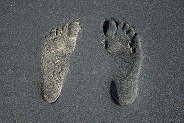  Fußspuren im Sandstrand