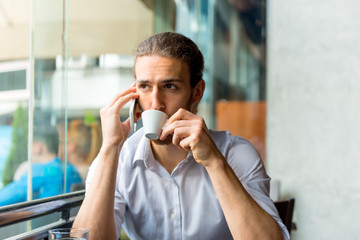Young Man in a Cafe