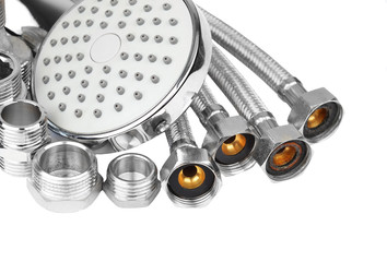 Plumbing fitting, hosepipe and showerhead, isolated on white 