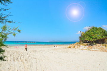 photographer and bathers in Alghero lido