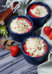 Homemade crumble with strawberry and rhubarb