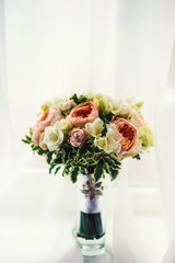 gentle wedding bouquet in a vase