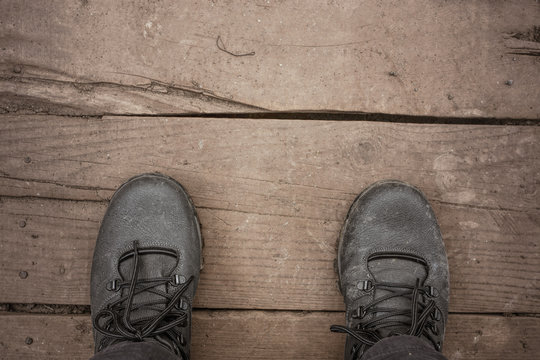 Dirty Shoes on wooden background
