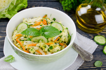 Cabbage salad with cucumber and carrots