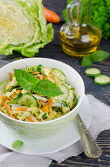 Cabbage salad with cucumber and carrots