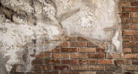 aged cracked concrete and brick wall background
