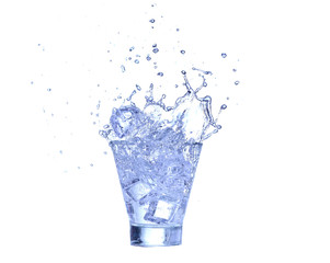 Glass of water, ice and slice of fresh lemon on a white background