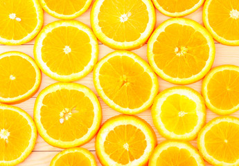 fresh, orange on a wooden background (seen from above)