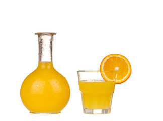 Orange juice in pitcher with orange. Isolated on white background
