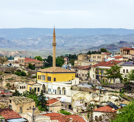Fototapeta na wymiar View on mosque in town Mustafa Pasha, Cappadocia, Turkey