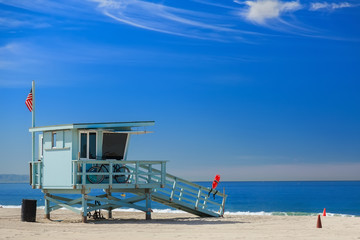 Lifeguard station with american flag on Hermosa beach - 84320298