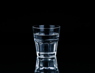 water on a glass on dark background.