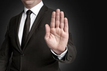 Hand Stop wird von Geschäftsmann gezeigt
