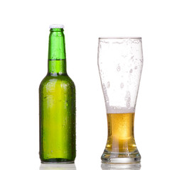 Beer bottle with drops isolated on wgite
