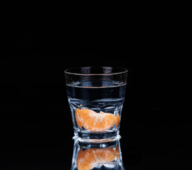 water on a glass on dark background.