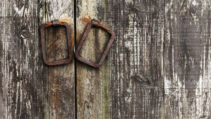 the part of wooden door with metal handle