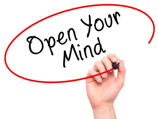 Man hand writing Open Your Mind with marker on transparent 