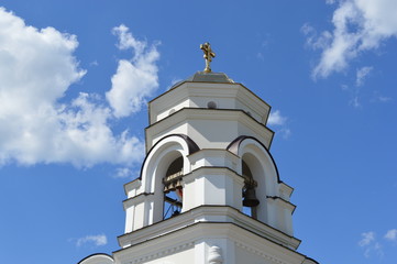 Church with gold cross on top (Moscow downtown)