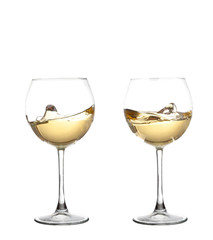 WHITE wine swirling in a goblet wine glass, isolated on a white