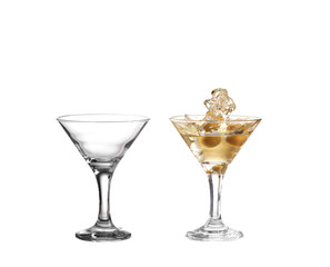  Splash from olive in a glass of cocktail, isolated on the white