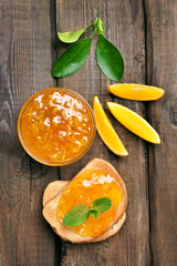 Bread and orange jam, top view