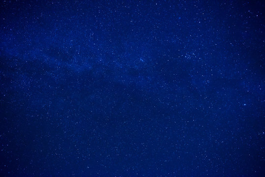 Blue dark night sky with many stars