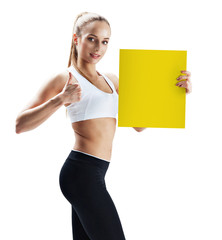 Fitness woman presenting empty placard