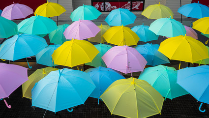 Umbrellas hanged on a lines in umbrella park