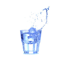 Glass of water, ice and slice of fresh lemon on a white background