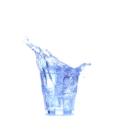Glass of water, ice and slice of fresh lemon on a white background