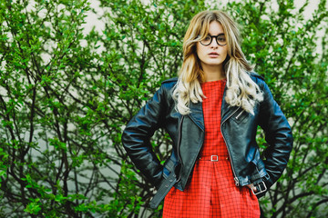 young beautiful blonde woman posing outdoor