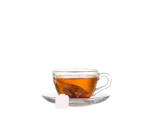 Tea in glass cup isolated on white background