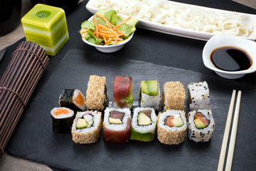 sushi rolls on the table of restaurant