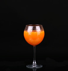 Glasses of organic juices isolated on the black