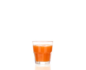 Juice pouring into glass isolated on white