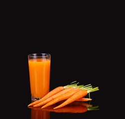 Carrots and juice in a glass