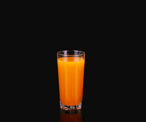 Carrots and juice in a glass