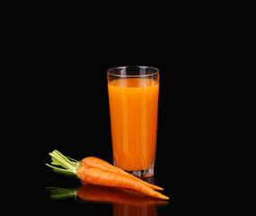 Carrots and juice in a glass