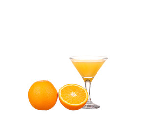 Glass of freshly pressed orange juice with sliced orange 