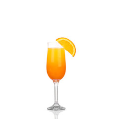 Glass of freshly pressed orange juice with sliced orange 