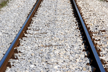 The steel rails of the railway track