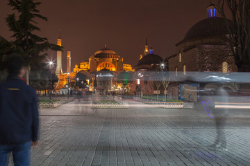 Fototapeta na wymiar tourists at night Hagia Sophia in Istanbul, Turkey