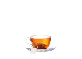 Herbal tea in a glass cup, fresh flowers 
