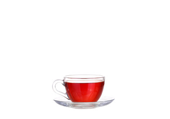 Herbal tea in a glass cup, fresh flowers 