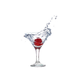 Strawberries, ice cubes into the glass