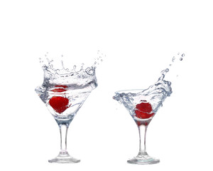 Strawberries, ice cubes into the glass